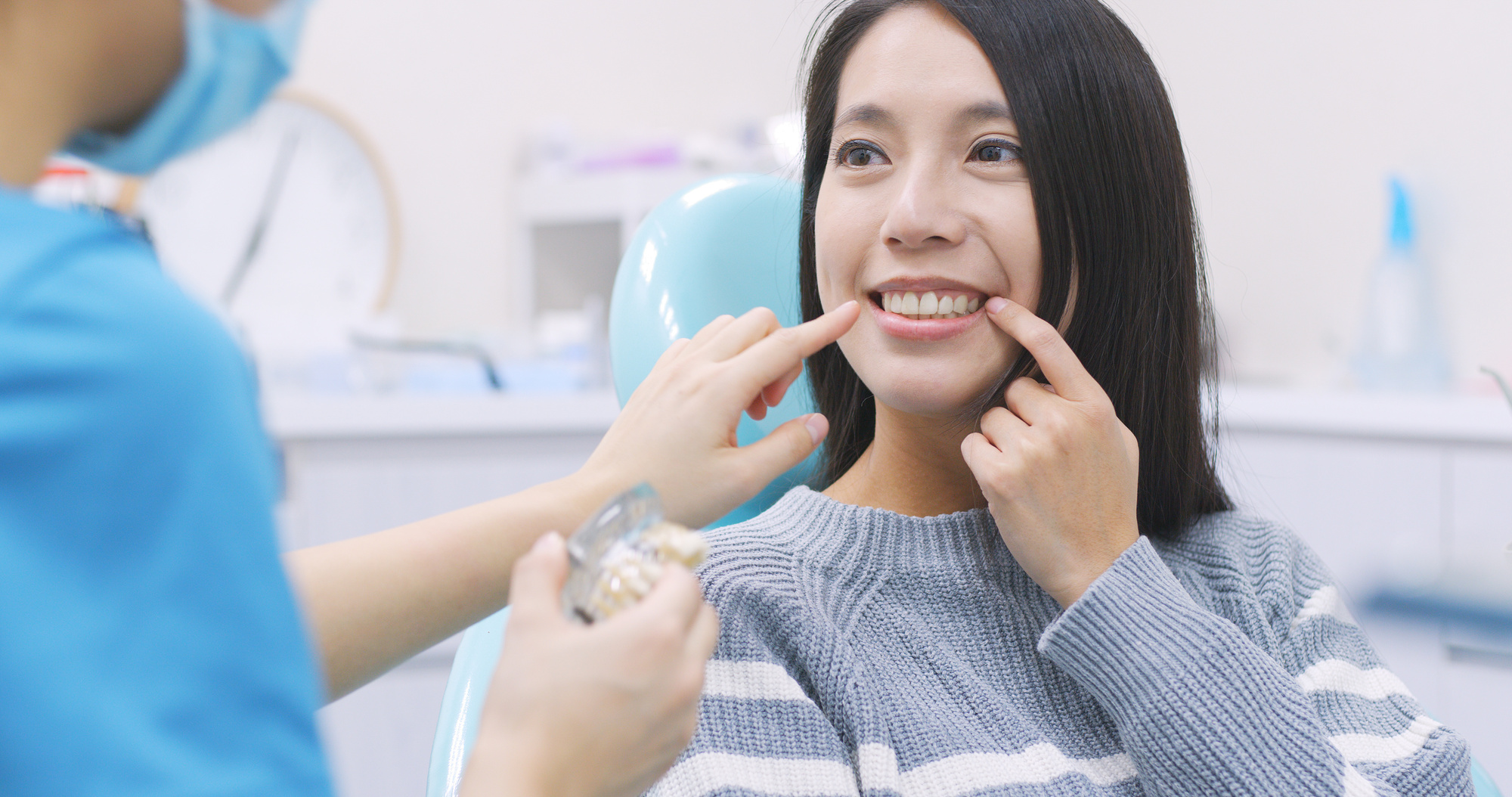 smiling woman at dentist