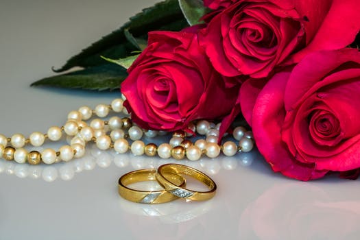 rings necklace and flowers