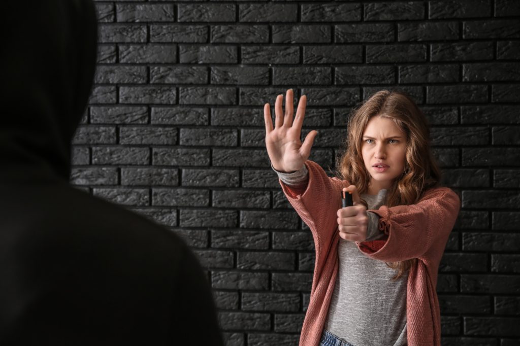 woman with pepper spray