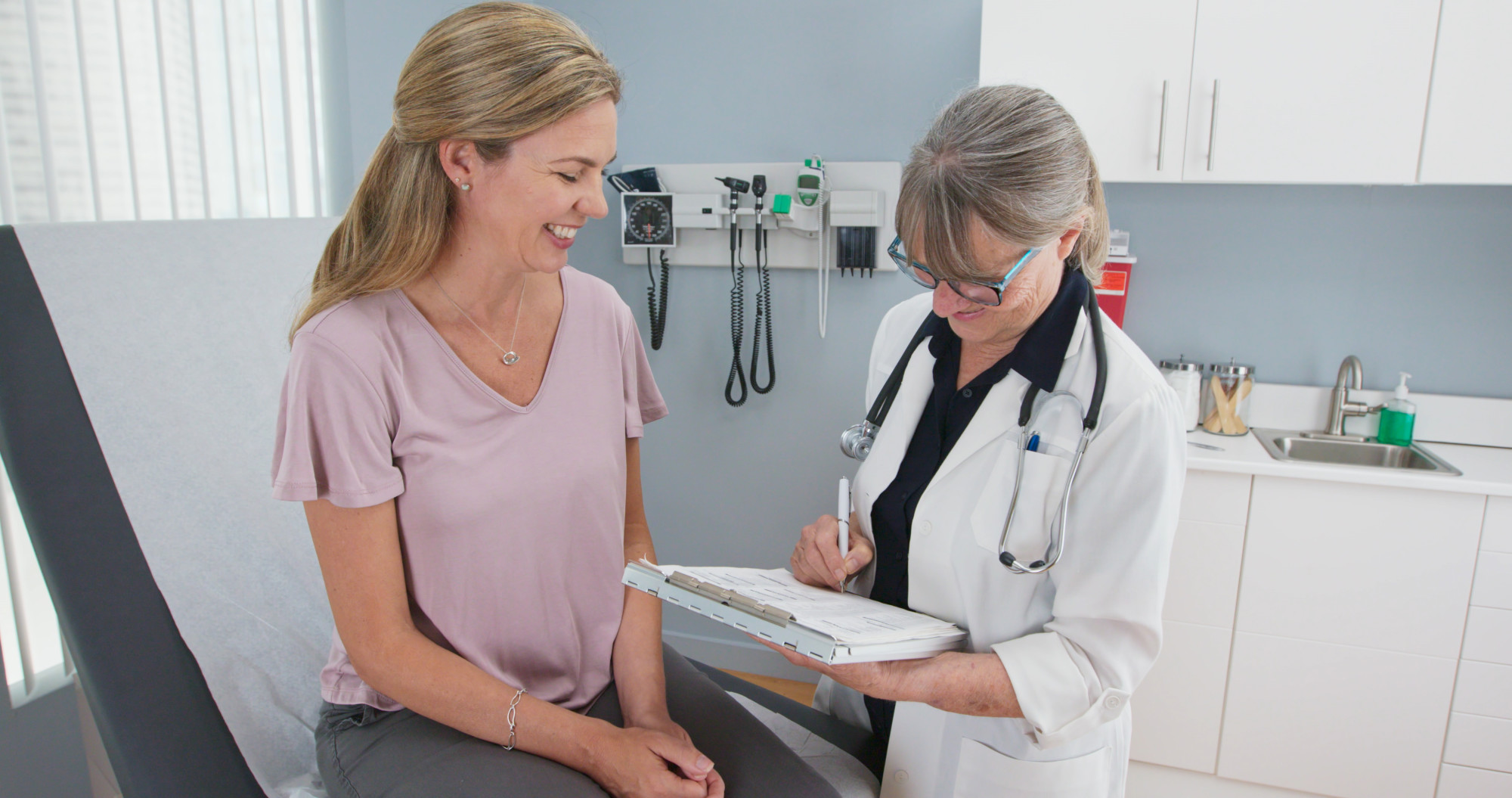 woman and doctor at OBGYN appointment