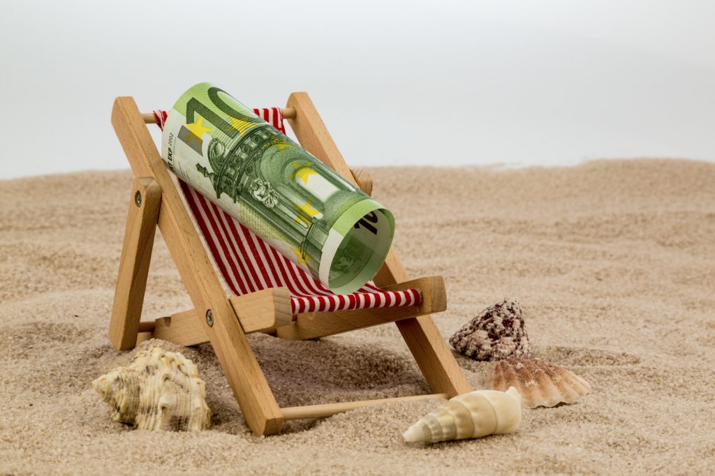 money on vacation at the beach