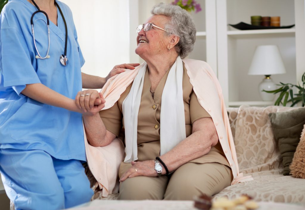 senior with care giver