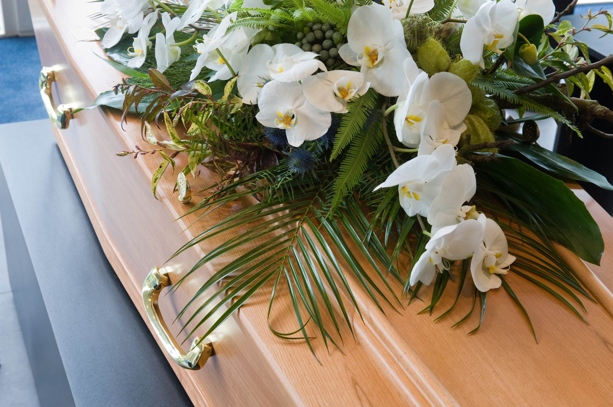funeral casket with flowers