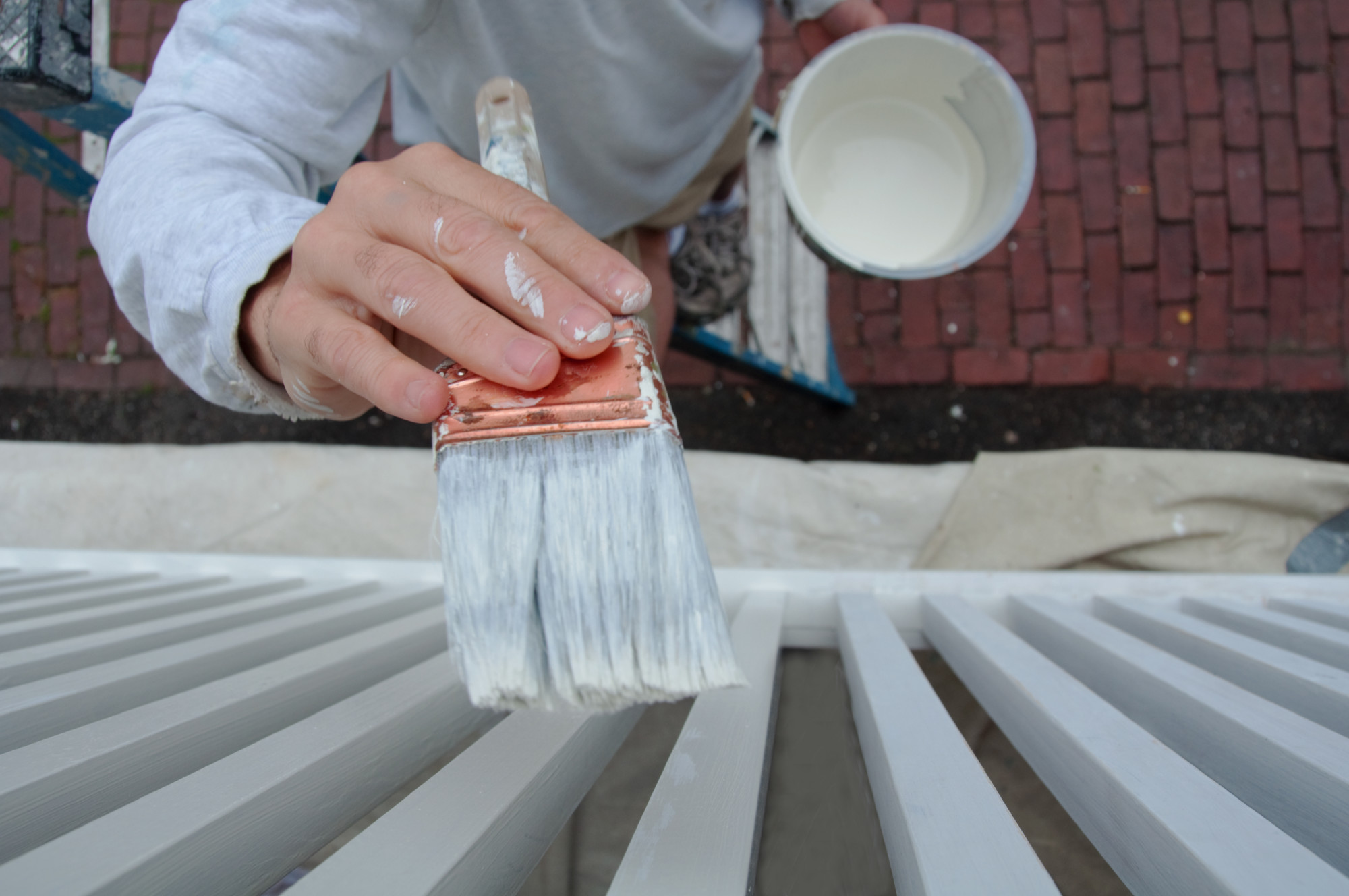 Man Painting House