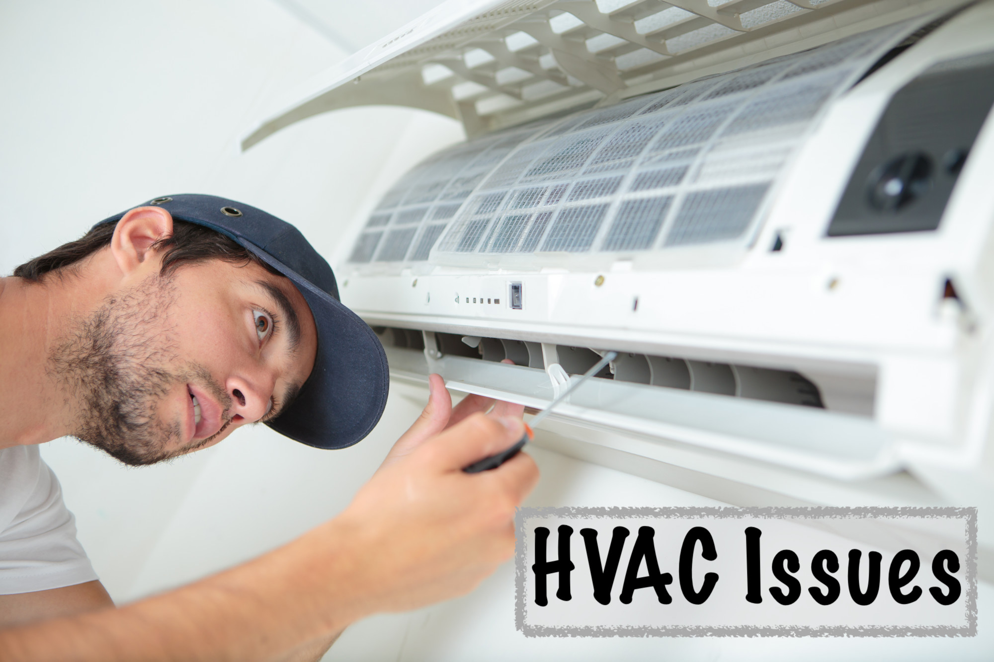 Man Fixing Airconditioner